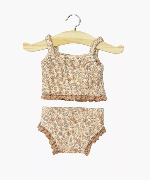 
    alt="Chevron descendant icône"
  