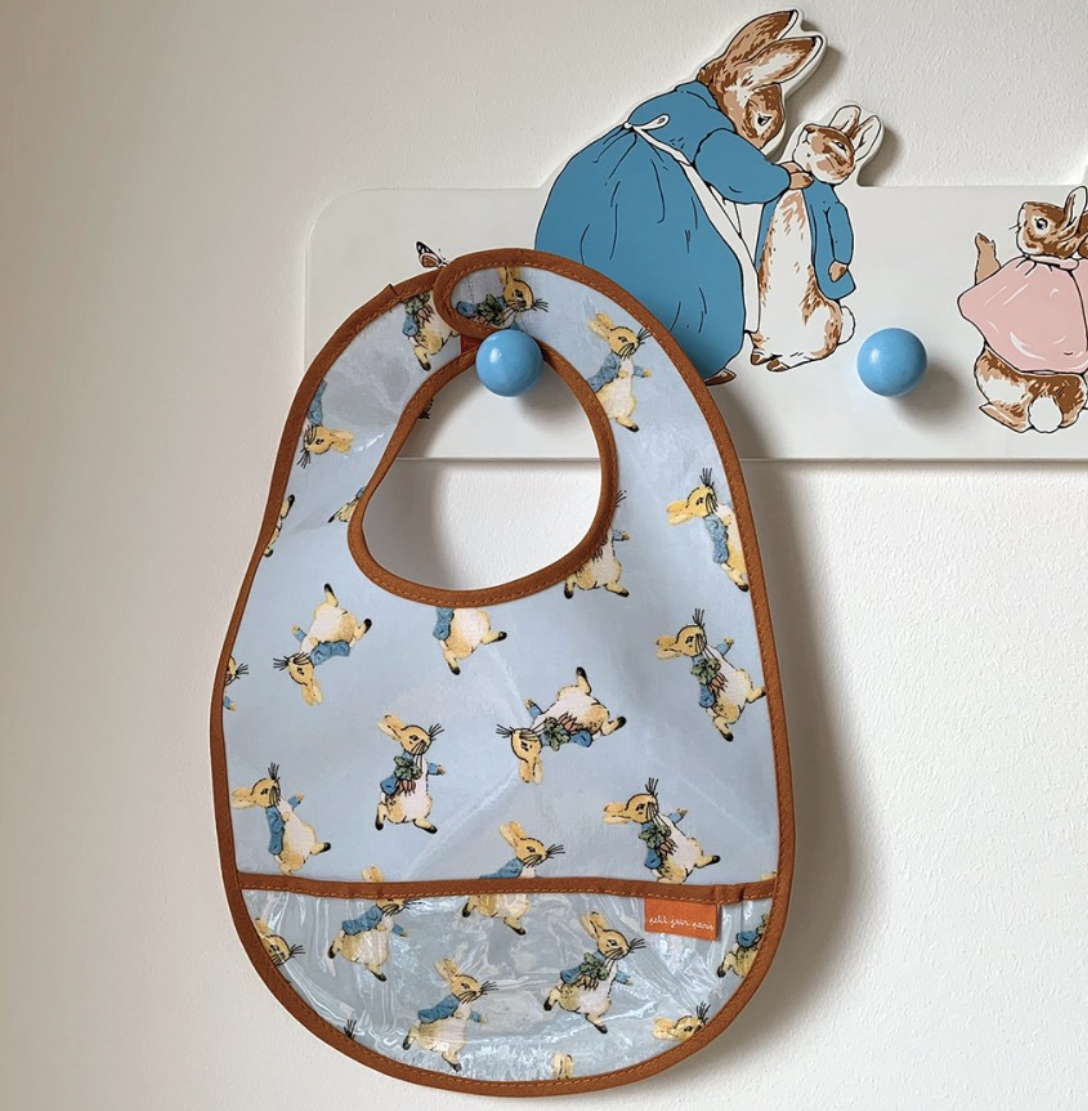 Bavoir en toile cirée Peter Rabbit PETIT JOUR